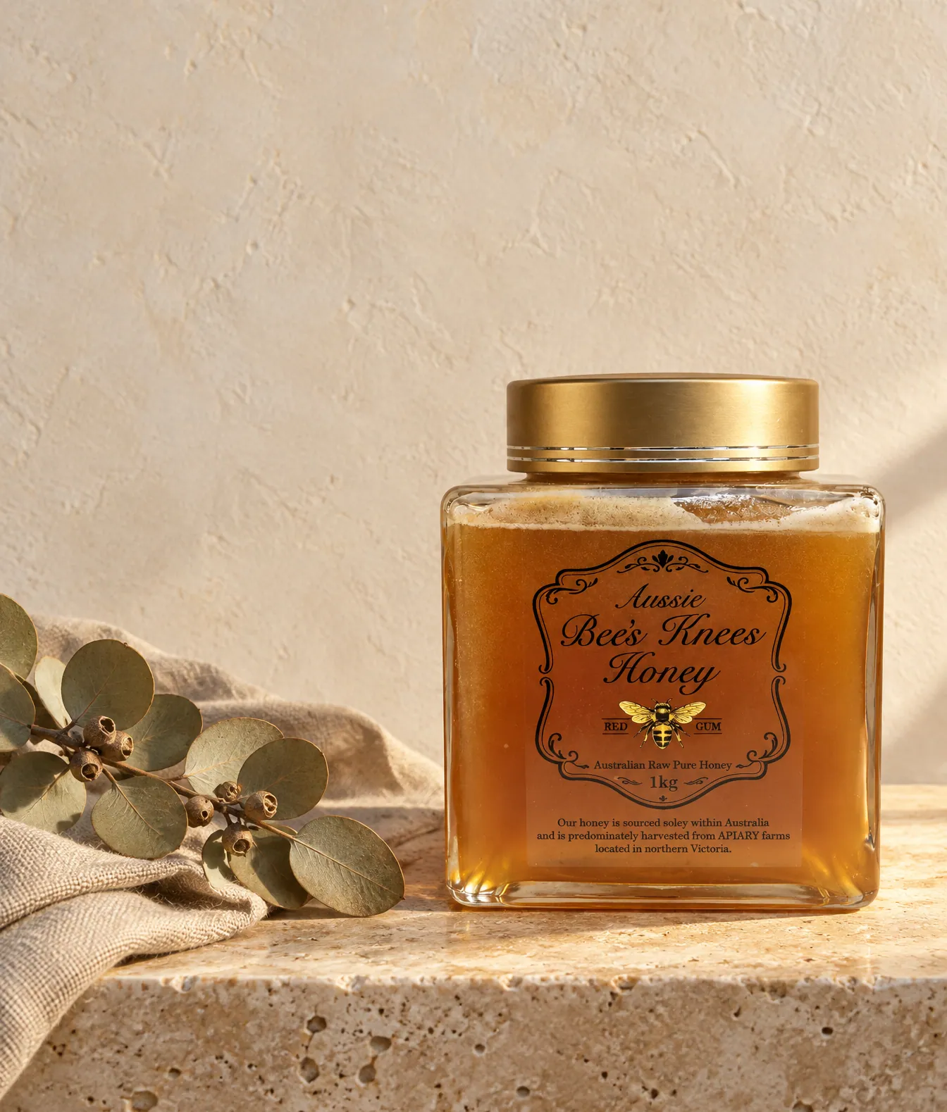 The 1kg jar on a sunlit stone ledge with dried eucalyptus